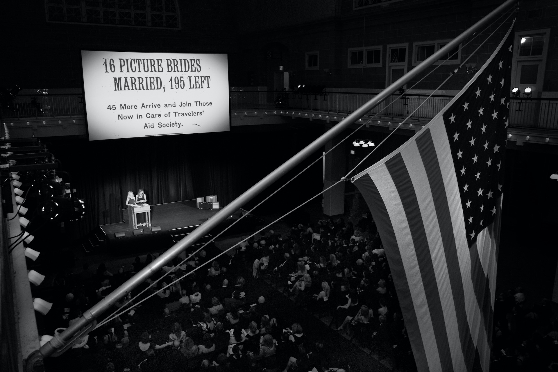 American flag and guests at the 2011 Gabby Awards on Ellis Island