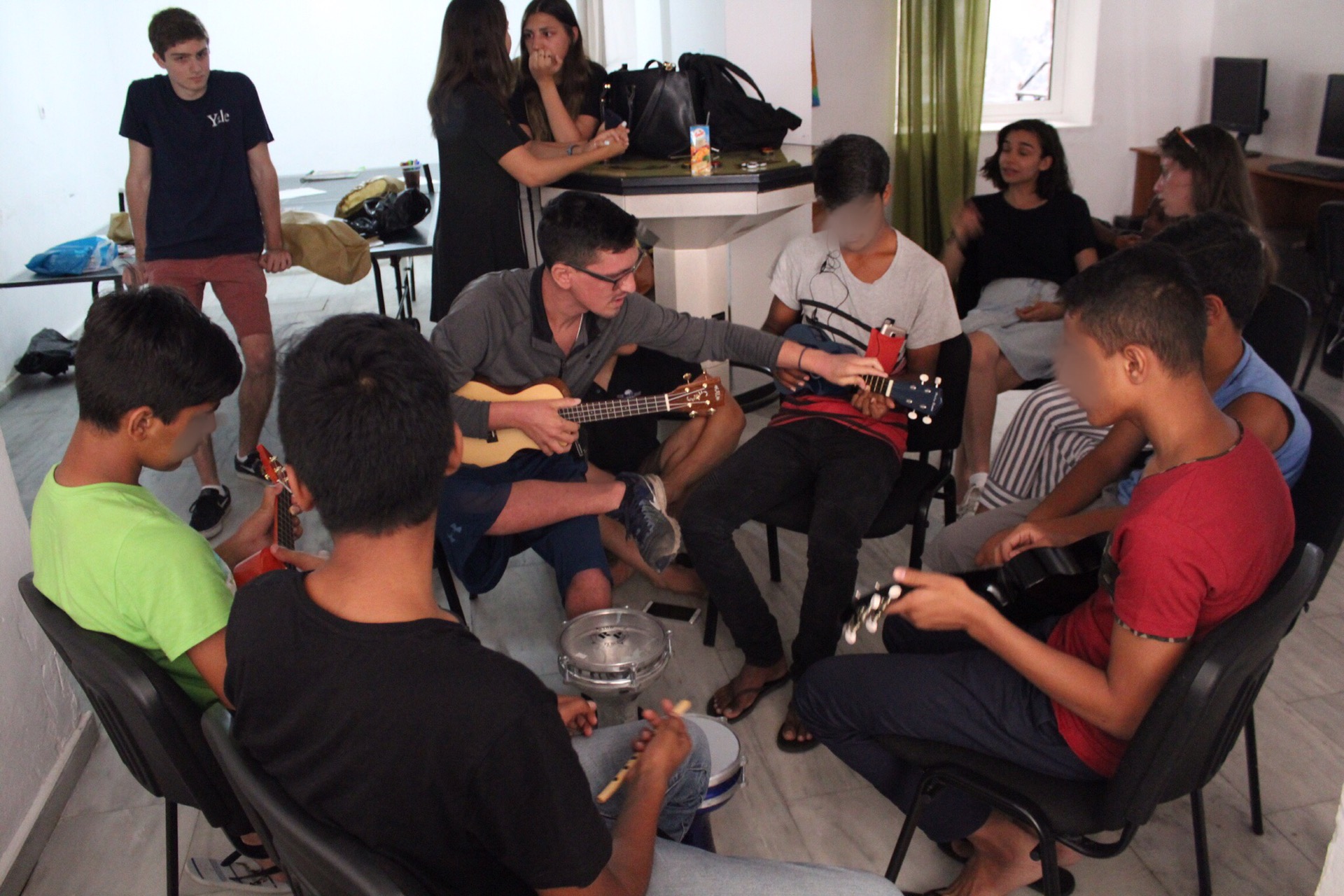 Greek America Foundation volunteers leading activities for refugee children in Athens