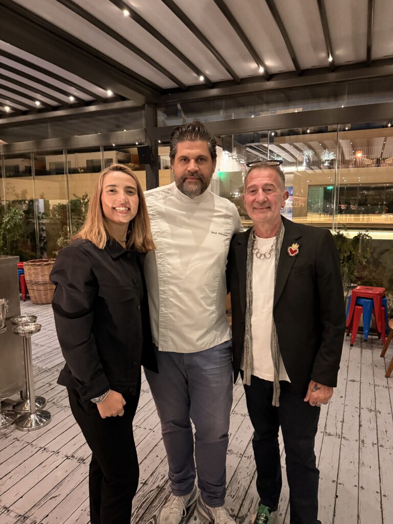 Natalia Bougadellis, Chef Iosif Sykianakis in a white chef’s jacket, and Gregory Pappas at the Athens dinner.