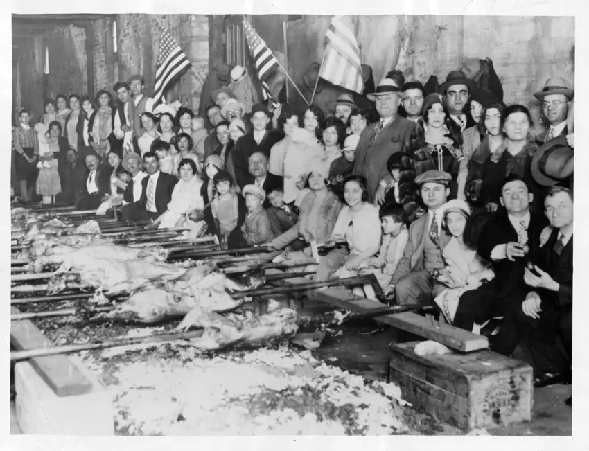 A large gathering around a banquet table